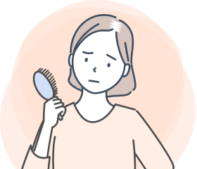 分け目が気になり始めた女性