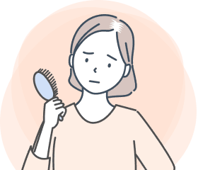 分け目が気になり始めた女性